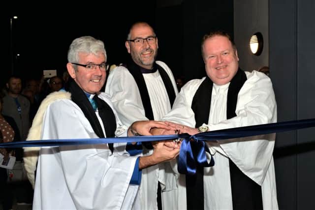 Dean Stephen Forde, Archdeacon George Davison and the Rector, Rev David Lockhart, cut the ribbon to officially open the new Inver Hall at St Cedma`s Parish Church. INLT 35-001-PSB