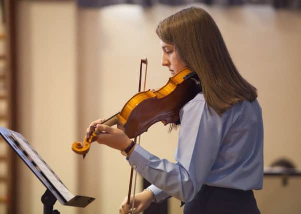 Emily Millar playing violin
