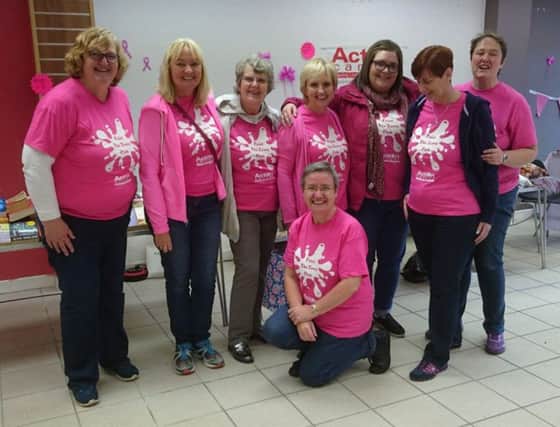 Banbridge Action Cancer Group vonunteers are tickled pink to be celebrating the fifth anniversary of its Paint the Town Pink campaign