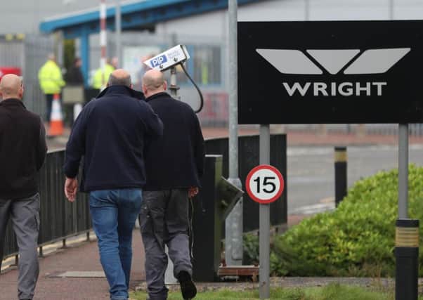 Workers leaving Wrightbus after the announcement that the company would be going into adminstration