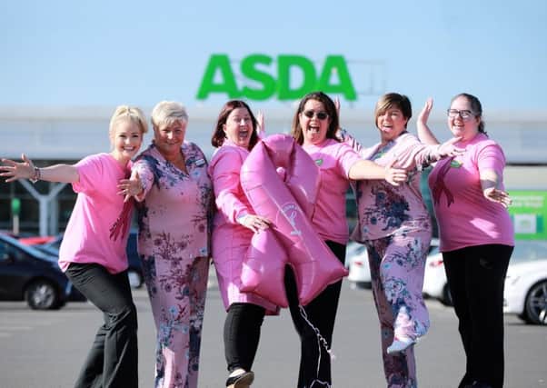 Shannon Linton, Asda Coleraine is joined by other community champion colleagues, Victoria Gregg, Asda Bangor, Barbara Logan, Asda Antrim, Shannon Linton, Asda Coleraine, Catherine McCallion, Asda Larne and Linda Owens, Asda Downpatrick alongside Dr Niamh Buckley, from the School of Pharmacy at Queens University Belfast and Breast Cancer Now Scientific Fellow