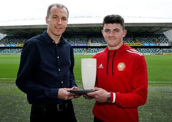 Portadown striker Lee Bonis collects his Championship Player of the Month award for September from Stuart McKinley (Northern Ireland Football Writers' Association chairman).