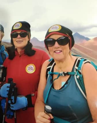Lisburn pair Donna McIlwaine and Kathleen Lindsay have taken part in six Action Cancer treks raising £35,000