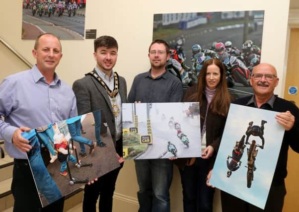 The Mayor of the Causeway Coast and Glens Borough Council, Councillor Sean Bateson pictured with Fergus Mackay, Event Operations Manager of the NW200, Dr Nicholas Wright, Museum Service Community Engagement Officer, Jane Blakely, winner in the Open Category and Wilbert McIlmoyle, one of the Peoples Choice winners in this years Capture the Moment International NW 200 photography competition