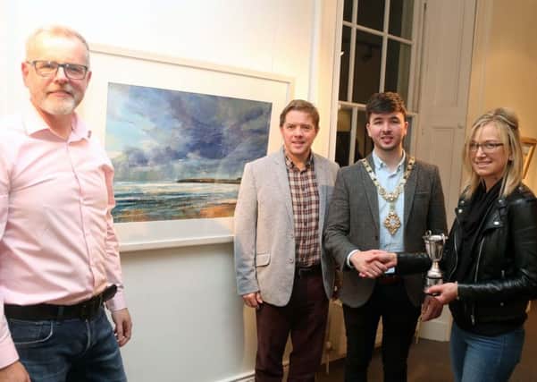 The Mayor of Causeway Coast and Glens Borough Council Councillor Sean Bateson pictured at the 71st exhibition launch of Coleraine Art Society at Flowerfield Arts Centre with Kevin McClelland, Coleraine Art Society Chairperson, Raymond Kennedy, Guest Judge and Sarah Carrington, award winner for her painting Dark Sky, Runkerry