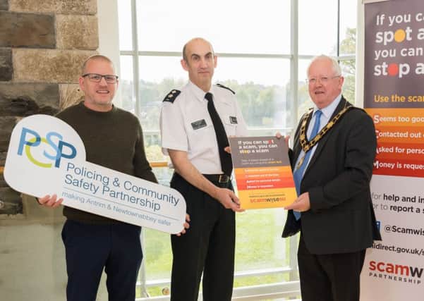 Councillor Paul Dunlop, Chair of PCSP, Chief Superintendent Walls, PSNI and Mayor of Antrim and Newtownabbey, Alderman John Smyth at the Scamwise Reminder meeting