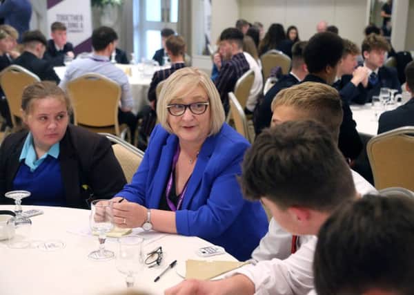 Councillor Brenda Chivers pictured with pupils from local secondary schools at the annual Lets Talk event at The Lodge Hotel in Coleraine