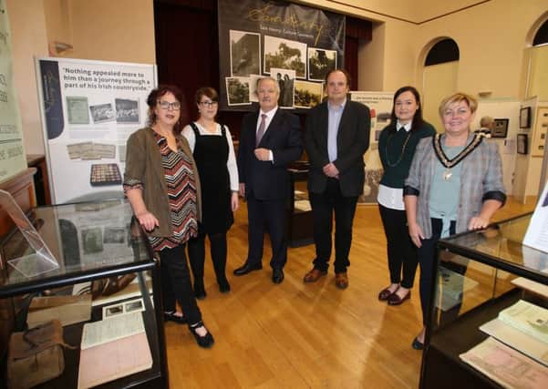 The Deputy Mayor of Causeway Coast and Glens Borough Council, Alderman Sharon McKillop pictured with Helen Perry, Museum Services Development Manager, Sarah Carson, Museum Officer, Gordon Craig, Sam Henrys grandson, Dr Frank Ferguson from Ulster University and Rachel Archibald, Project Cataloguer at the launch of the Sam Henry: Culture Connects exhibition at Ballymoney Museum