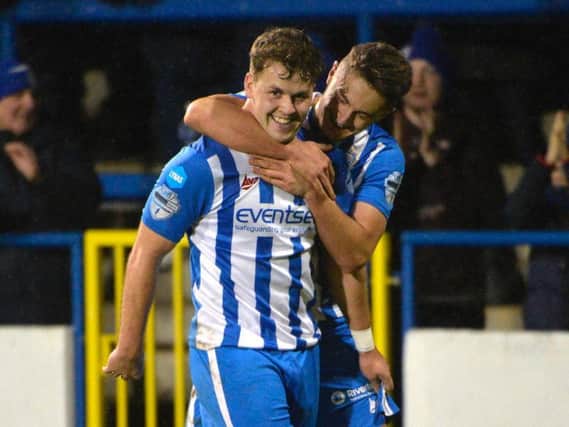 Ben Doherty celebrates a goal with Aaron Jarvis