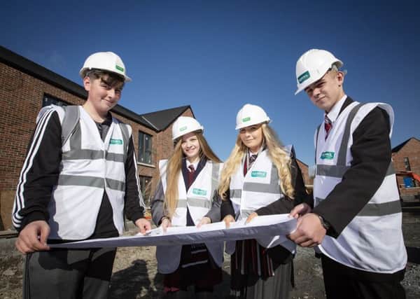Pupils from Edmund Rice College, Hazelwood Integrated College, Glengormley High and Abbey Community College at Clanmils Carnmoney Road site, Glengormley, where 48 new home are being built, as part of a campaign that promotes careers in the construction industry.