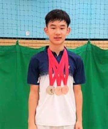 Matthew Cheung with medals from Leigh U17 a Silver in Boy's Doubles and Bronze in Singles and Mixed