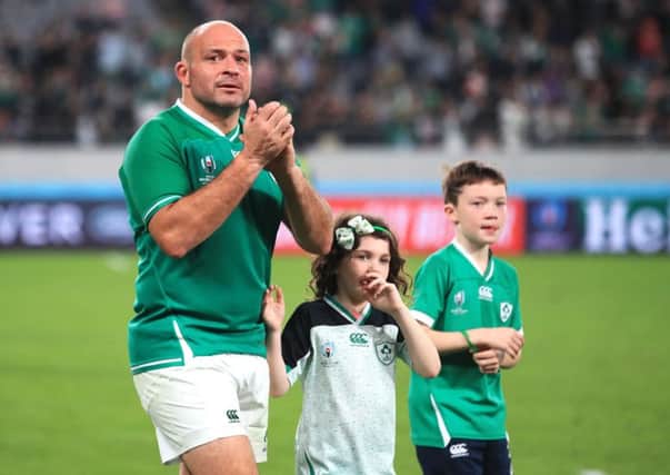 Ireland's Rory Best applauds the fans alongside his children children Ben (right) and Penny after the 2019 Rugby World Cup Quarter Final match at Tokyo Stadium. PA Photo.
