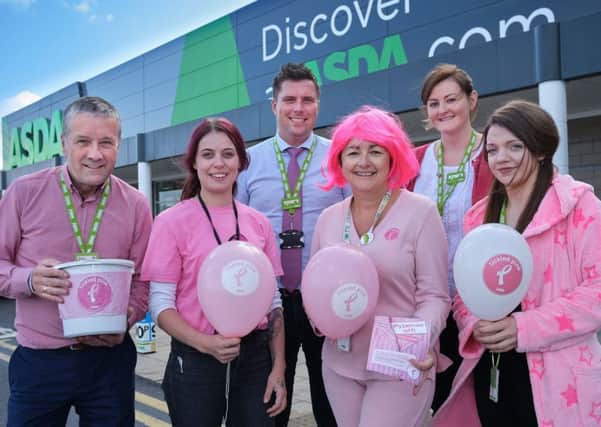 Peter Beckett, Asda Cookstown GSM, Neill Gillander, manager, Fionnuala Morgan, section leader, Janice Gibson, Community Champion Emer Devin, manager and Briege McCorry, colleague