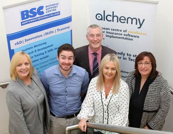 Pictured at Alchemy Technology Services premises in Derry~Londonderry are (front centre) previous Academy graduates Colin Montgomery and Rachel Gallagher with (left) Sinead Hawkins of North West Regional College, Graeme Wilkinson of DfE and Anne ONeill of Alchemy.
