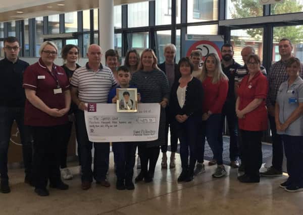 The Western Health and Social Care Trust (Western Trust) has gratefully acknowledged a wonderful donation to the Sperrin Unit, North West Cancer Centre, Altnagelvin Hospital from the family of the late Elaine McGlinchey from Magheraboy, Killygordon who passed away last November. Elaine had received treatment in the Sperrin Unit. ¬14,323.51 was raised from a very successful tractor run in Elaine's memory.