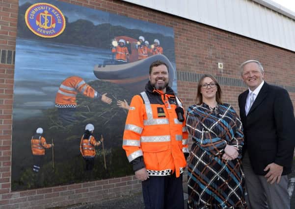 Barry Torrens, Unit Commander of Coleraine Unit, Community Rescue Service (CRS); Leanne Abernethy, IMPACT Project Manager and IFI Board Member, Allen McAdam pictured at the unveiling of a new mural that marks the end of a successful  community based wellbeing initiative around the North Coast