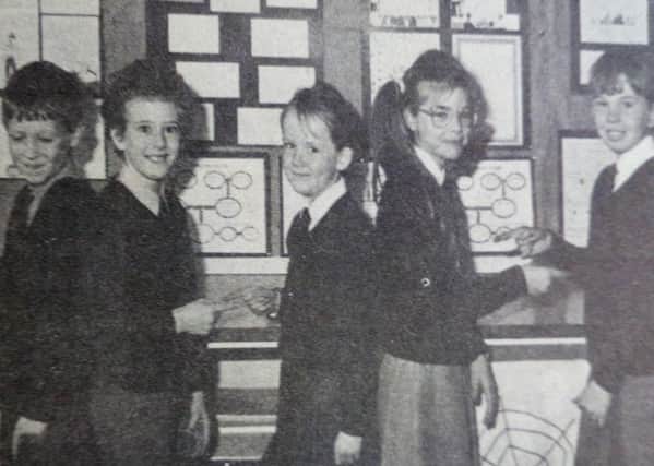 Primary Five pupils at Portglenone Primary pictured with some of their work for their All About Us Project. 1989
