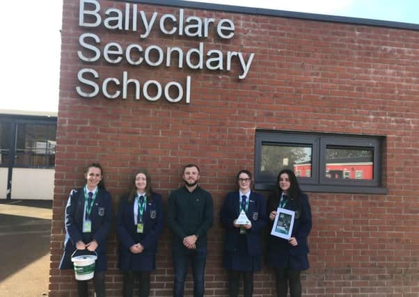 Concerns Community Fundraiser Dylan Murdock with Ballyclare Secondary School pupils.