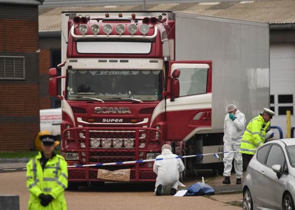 Police and forensic officers activity at the Waterglade Industrial Park in Grays, Essex, after 39 bodies were found inside a lorry on the industrial estate. PA Photo. Picture date: Wednesday October 23, 2019. Early indications suggest there 38 are adults and one teenager, police said. The lorry is from Bulgaria and entered the country at Holyhead, North Wales, one of the main port for ferries from Ireland. See PA story POLICE Container. Photo credit should read: Stefan Rousseau/PA Wire