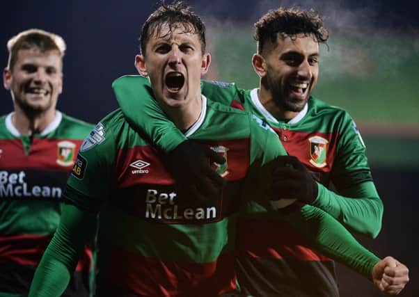 Glentoran captain Marcus Kane enjoys his goal against Ballymena United. Pic by Pacemaker.