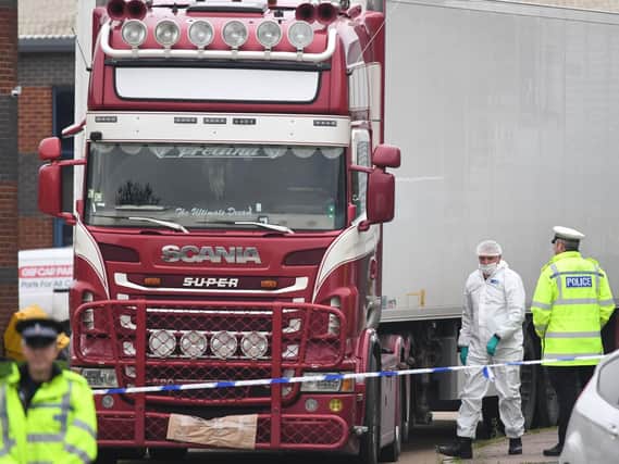 The 39 dead men and women discovered inside this refrigerated lorry container could have been trafficked through Russia, say police in Vietnam. (Photo: Stefan Rousseau/PA Wire)