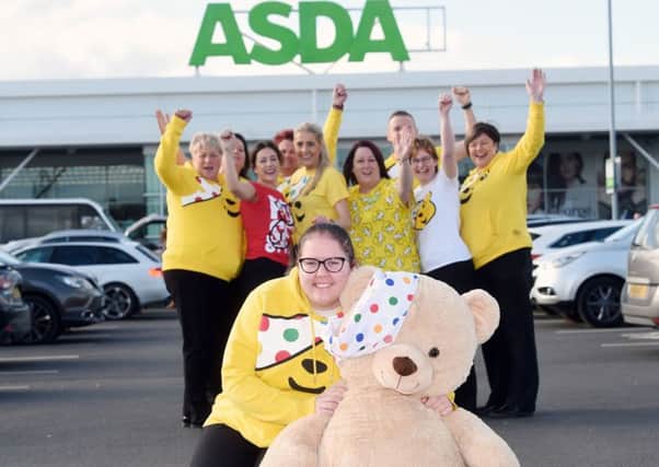 Asda Coleraine Community Champion, Shannon Linton, is set to fundraise for BBC Children in Need this November. Pictured with Asda Community Champions from across NI