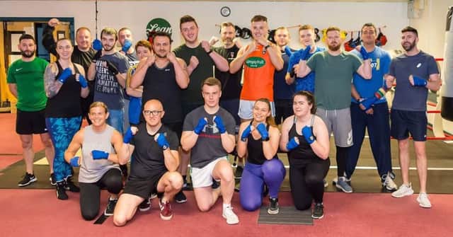 Staff from Tesco Banbridge, Portadown, Lurgan and Craigavon get ready for their Fight Night to raise funds to buy Lexie a trike for Christmas