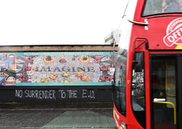Graffiti relating to Brexit at a peace Wall in Belfast in October.
Photo: Colm Lenaghan/Pacemaker Press