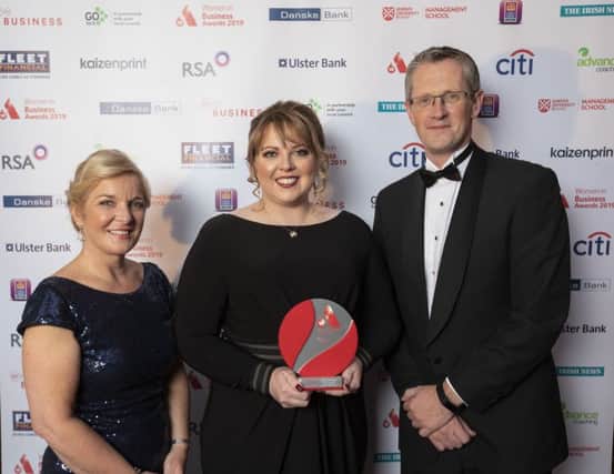 Women in Business Chair Nichola Robinson with small business winner of the Award for Outstanding Innovation, Dr Esther L. Skelly-Smith, Shanaghan Veterinary Services, with sponsor Adrian Moynihan, First Trust Bank