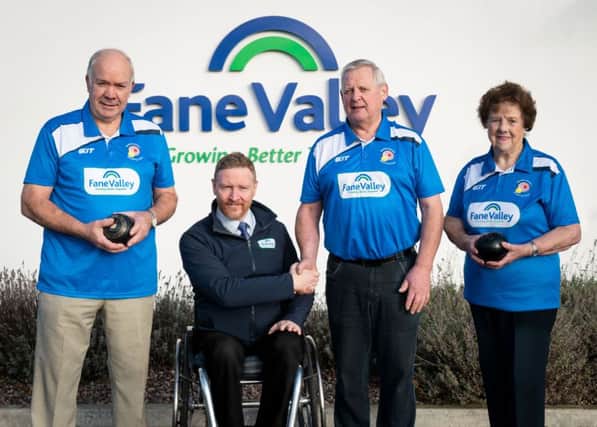Niall McCool, Fane Valley Group, Communications and Marketing Manager presents Soldierstown Bowling Members with their new playing shirt for the 2019/20 season