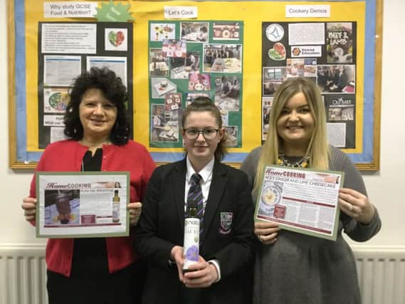 GCSE Home Economics student, Grace Magill is pictured with Ms D McSorley, Head of HE and Mrs D Reilly, HE Department