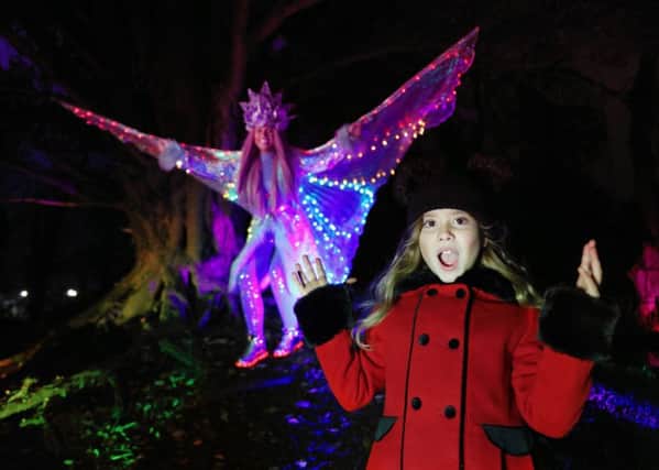 Pictured lighting up Antrim Castle Gardens is Enchanted Winter Princess, Sarah McIlmoyle and Eva Burnside. Picture by  Press Eye/Darren Kidd.