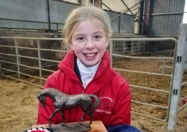 Robyn McMurray pictured at the Ulster Schools Dressage at Gransha Equestrian Centre with her trophy