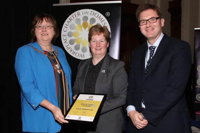 Onus Chairperson Jackie Patton presents the MEA BC - Platinum and Safe Borough award to Mayor Maureen Morrow.