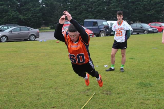 Callum Starkey takes part in NFL Style Combine during the recruitment day in Lurgan