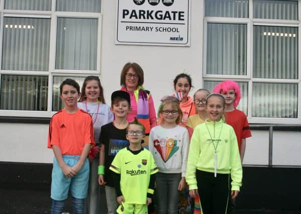 The whole school took part in an initiative aimed at increasing activity levels as families ditched their cars in favour of walking, cycling or scooting to school.
Pupils donned their brightest outfits to ensure they were visible to motorists as part of the Sustrans Active Schools Ditch the Dark Day event.