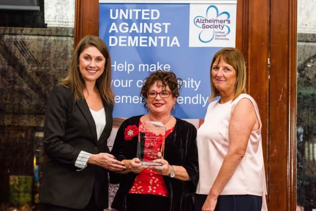 Sarah Travers with Geraldine Mulvenna and Bernadine McCrory, director Alzheimer's Society.  Picture: Elaine Hill Photography
