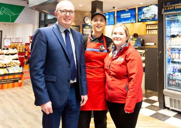 At the newly refurbished SPAR store in Larne  are Ian Mullin, area manager;  Kathy Moore, Greggs manager and Nicola Robinson, store manager