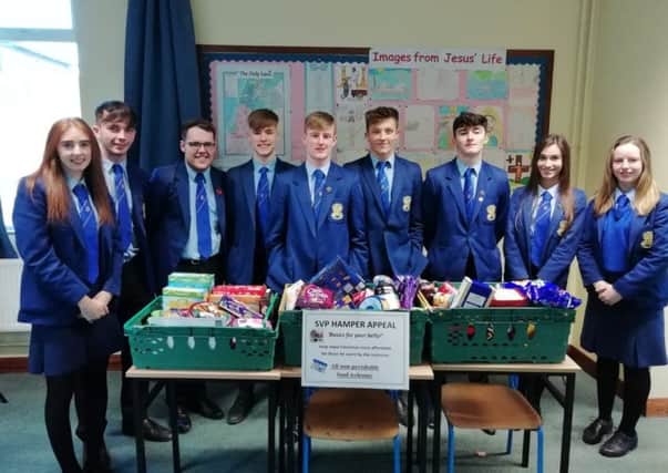 Loreto College students with some of the hampers donated to the Society of St Vincent de Paul this Christmas