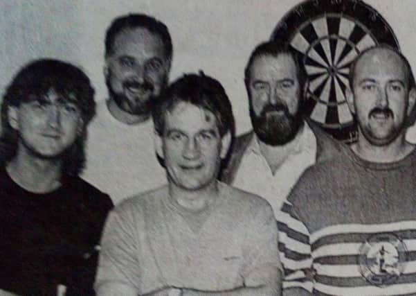 Members of the Blackstone Darts Team pictured before their first match of the season with The Thatch Blues. 1989