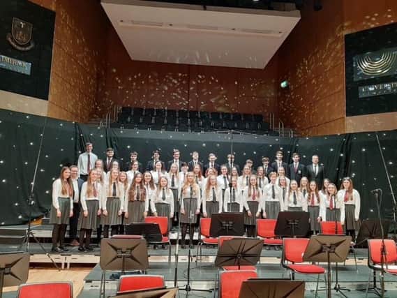 Carrickfergus Grammar School choir on stage in Limerick