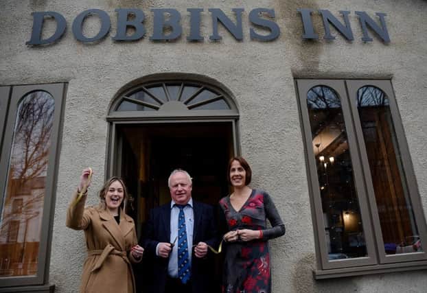 Councillors Cheryl Johnston and Robin Stewart with Kirsty Fallis, owner of  Dobbins Inn Hotel.