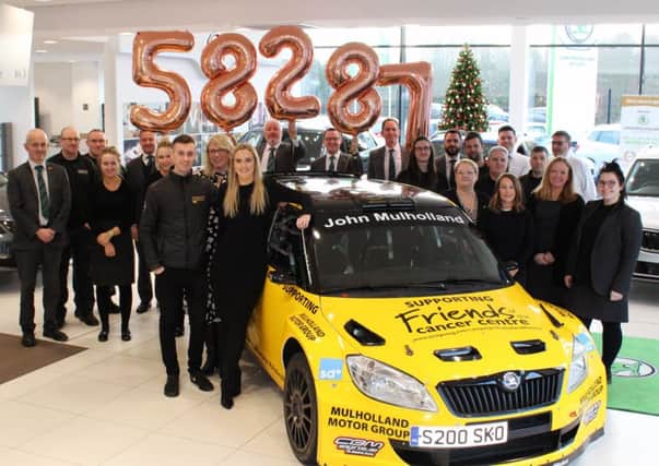 Randalstown and Campsie based car retailer John Mulholland Motors have donated £58,287 to local charity Friends of the Cancer Centre.