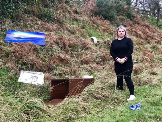 Councillor Jill Macauley at the site of the latest  flytipping incident on the Kilkinamurry Road, Katesbridge