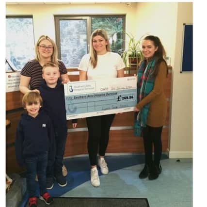 Pictured are Representatives and students from Lyness Stage School presenting the cheque to Lizzie McCullough, Fundraising Officer, SAHS