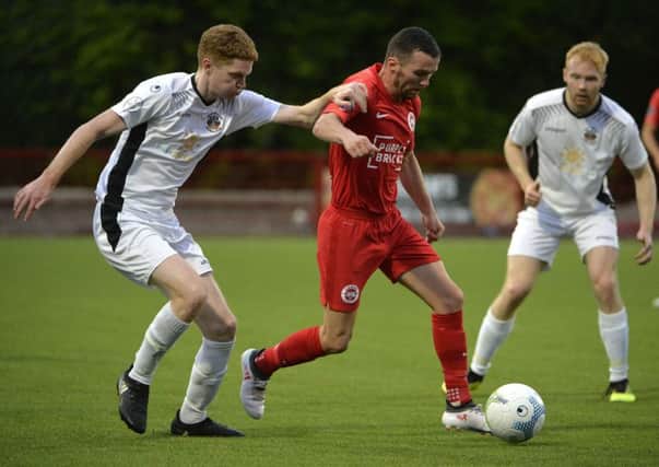 Larne's Martin Donnelly on the attack. Pic by INPHO.