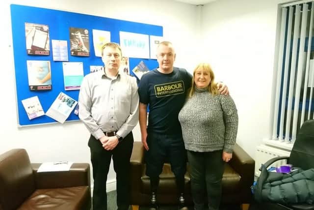Bryan with members of the Listening Ear group.