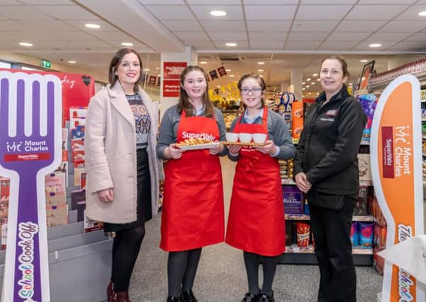Sophia Woods and Niamh Reynolds from St. Killian's College, Antrim with their Home Economics teacher Catherine Diamond (left) and Assistant Manager of SuperValu Kells, Debbie McGall.