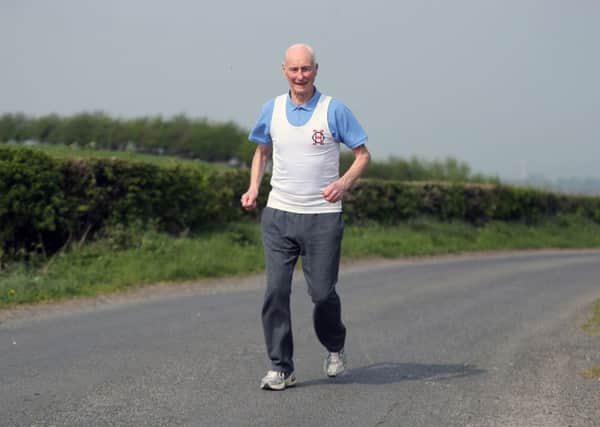 File photo dated 18/04/19 of London Marathon Ever Present runner Ken Jones at his home in Strabane Co. Londonderry. PA Photo. Issue date: Tuesday February 4, 2020. See PA story SPORT Marathon. Photo credit should read: Niall Carson/PA Wire