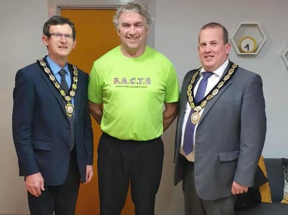 Pictured at the opening of the FACTS office in Magherafelt are Mid Ulster Council Chair, Councillor Martin Kearney, Tommy and Cllr Clement Cuthbertson Vice Chair of the Council.